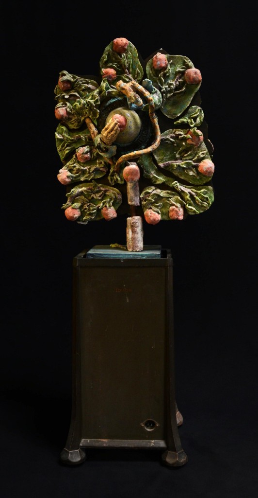 Mother Come ForthBack view) assemblage with clay and found objects by Leslie Ann McQuaide
