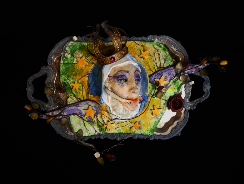 There Are More Ladies In Heaven Than Purgatory assemblage with clay and other found objects by Leslie Ann McQuaide